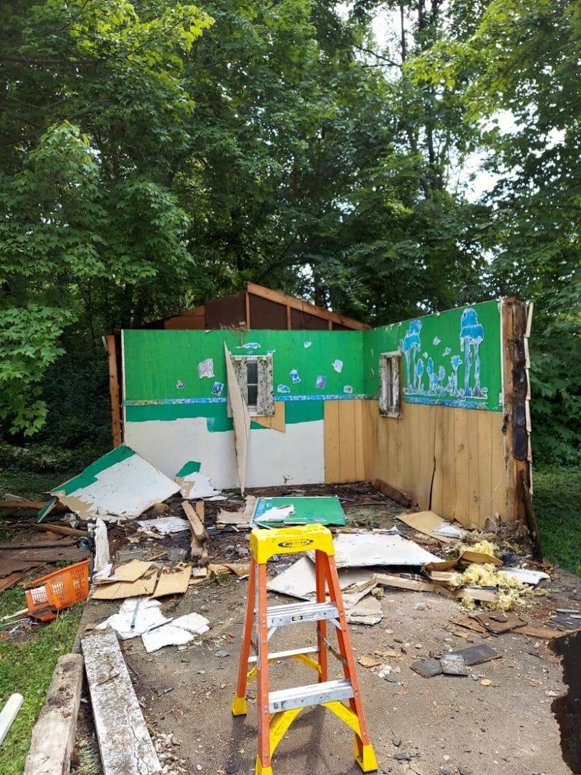 Shed demolition in progress